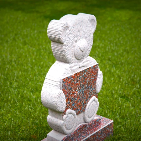 Sympathetic grave markers for kids featuring plaque-holding teddy