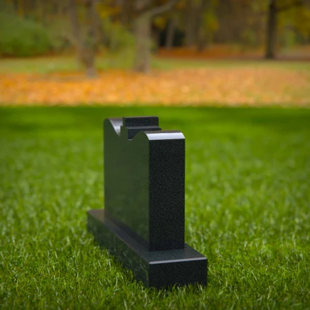 Traditional tombstones elevated with symmetry and spiritual storytelling