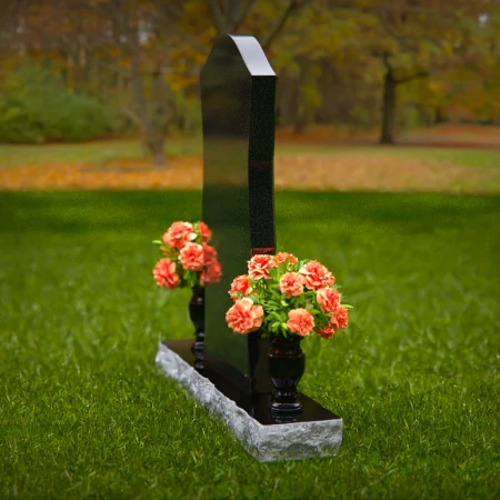 Elegant headstones with unique contours and dual flower vases.