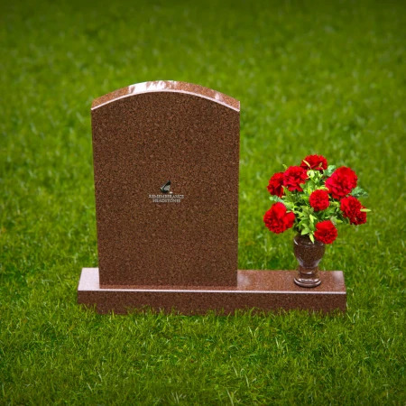 Beautiful upright headstones with flower vase details.