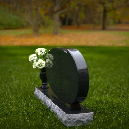 Oval granite headstones with timeless elegance for memorial tribute.