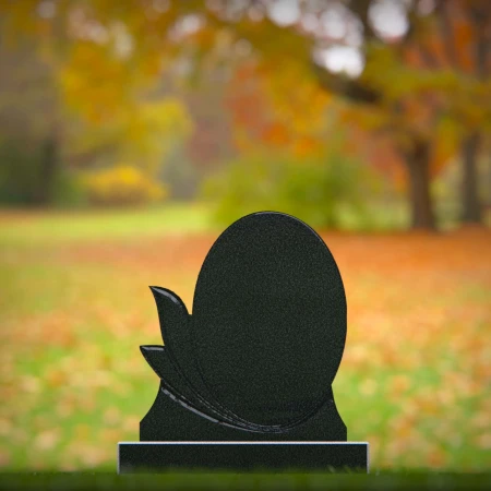 oval silhouette headstone etched with graceful leaves for headstone prices