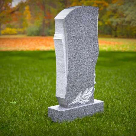 Carved forms reflect dignity and meaning in sculpted tombstones