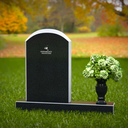 Classic arched headstones with elegant polished edges for tribute.