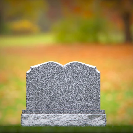 1951 - Elegant Double Upright Granite Headstone with Soft Arched Top