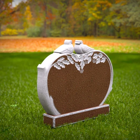 paired birds carved into granite for timeless remembrance for headstones