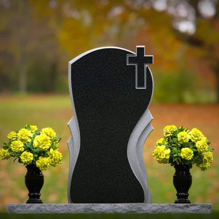 Graceful memorial headstones with cross detail for sacred remembrance.