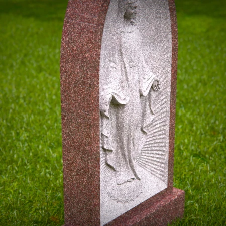 This tribute blends elegance with sacred imagery for headstone prices