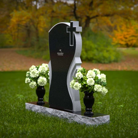 Graceful memorial headstones with cross detail for sacred remembrance.