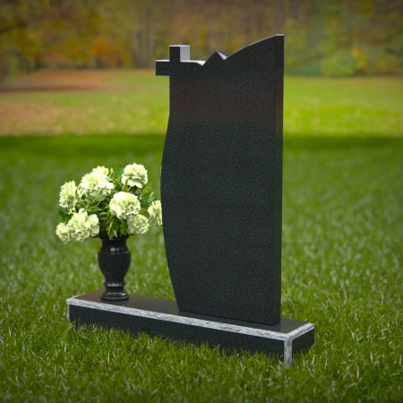 Unique headstones featuring a cross and elegant plaque design.