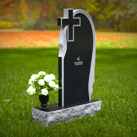 Graceful asymmetrical granite headstones with cross, symbolizing faith and remembrance.
