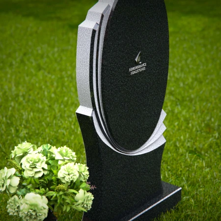 Elegant oval granite headstones with layered accents for lasting tributes.