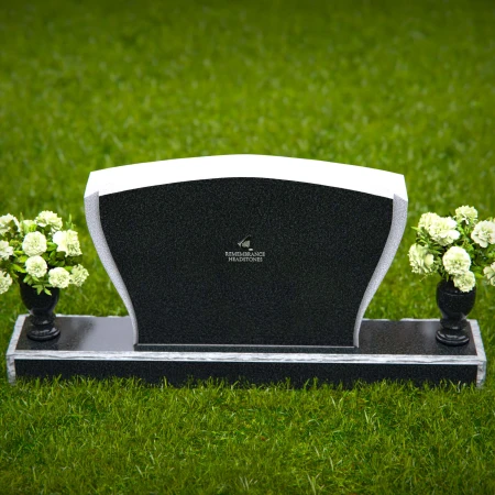 Elegant double vase headstones with contoured design for tribute.