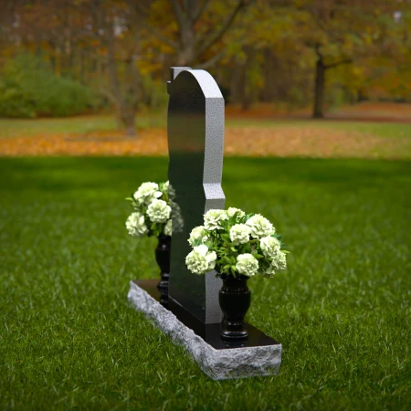 Graceful memorial headstones with cross detail for sacred remembrance.