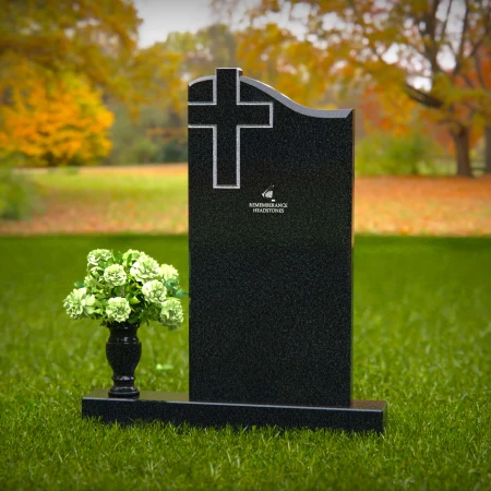 Granite headstones with cross engraving symbolizing faith and remembrance.