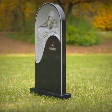 headstone, tombstone, bronze grave markers, grave ornaments, polished black granite headstone with engraved Jesus Christ figure, elegant black granite memorial stone featuring a religious depiction.