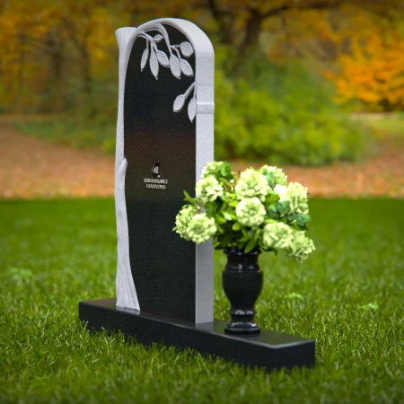 Elegant headstones featuring a tree design symbolizing growth and life.