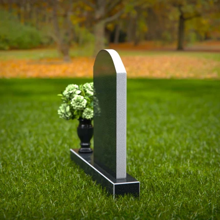 Classic arched headstones with elegant polished edges for tribute.