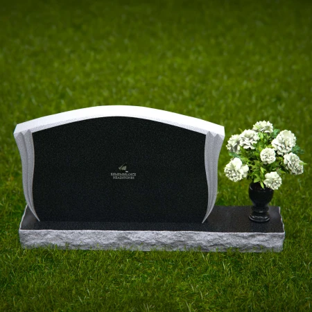 Elegant contoured headstones with flower vase for refined tribute.