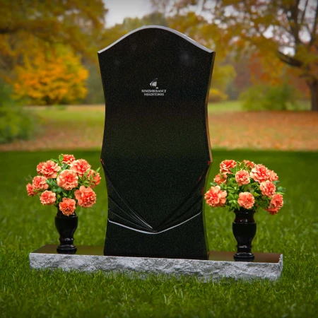 Elegant headstones with unique contours and dual flower vases.
