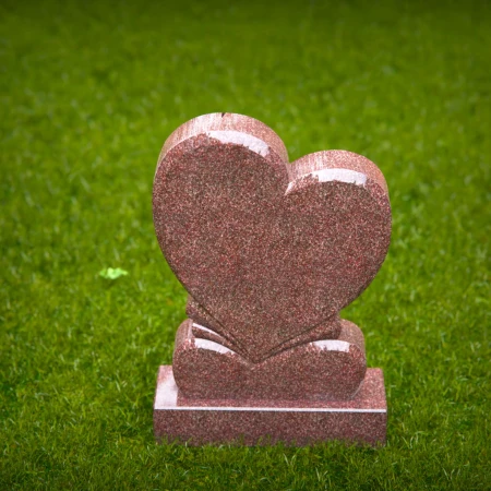 dual heart headstone etched with timeless emotional depth for memorials
