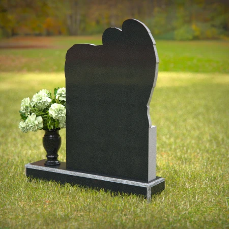 Granite angel heart headstones with floral vases for loving memorials.