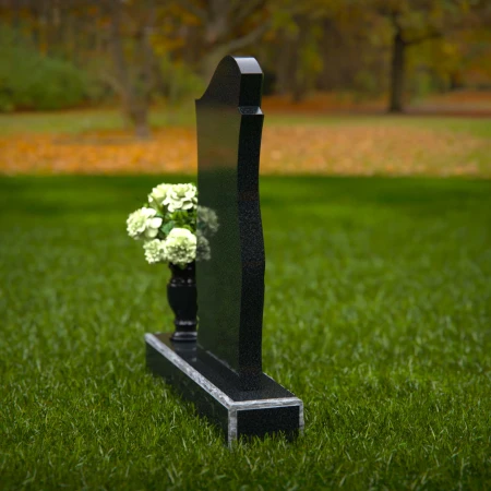Elegant wave design headstones crafted for lasting remembrance.