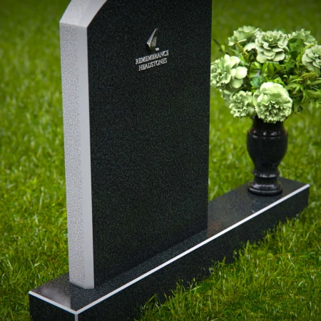 Classic arched headstones with elegant polished edges for tribute.