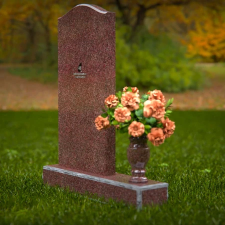 Modern upright headstones with gentle curves and vase tribute.