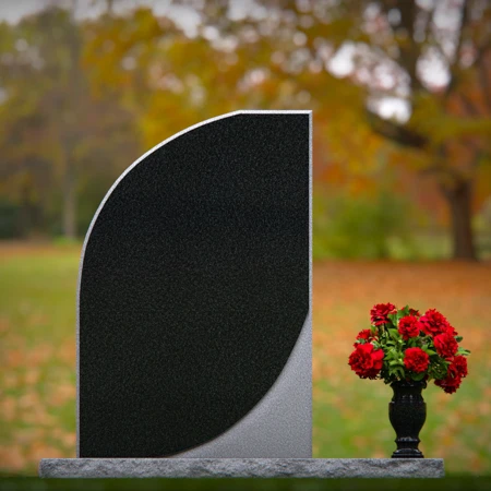 Modern curved memorial headstones with dual-tone finish for elegant tribute.
