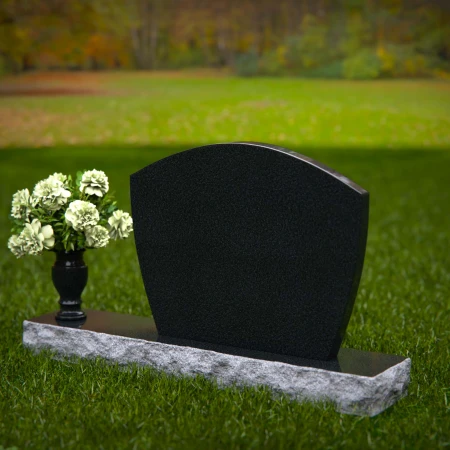 Classic arched granite headstones designed for a timeless memorial.