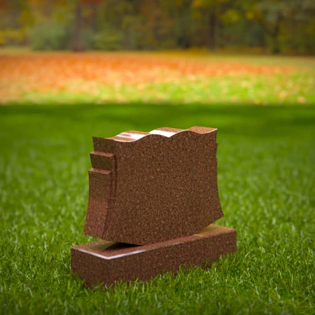 1957 - Klassischer Granitgrabstein mit skulptierten Konturen