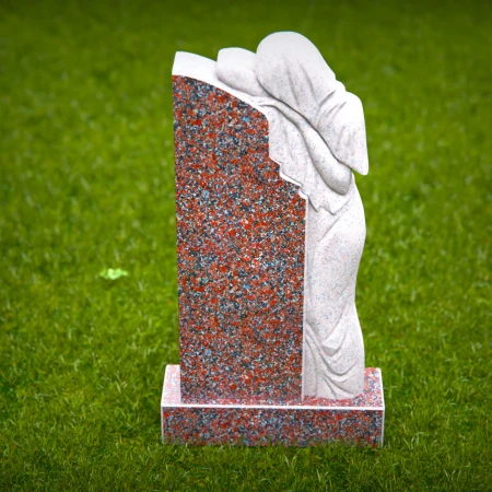 A graceful winged figure carved to reflect loving grave markers