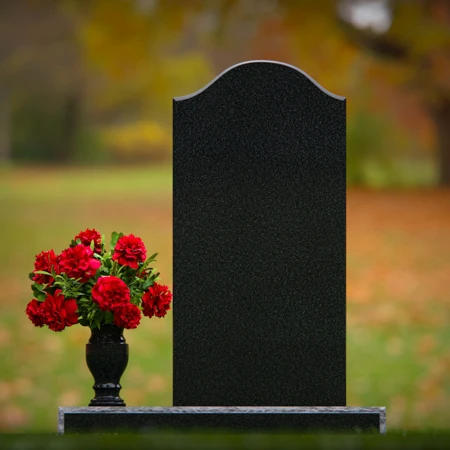 Classic upright headstones with flower vase for timeless memorials.