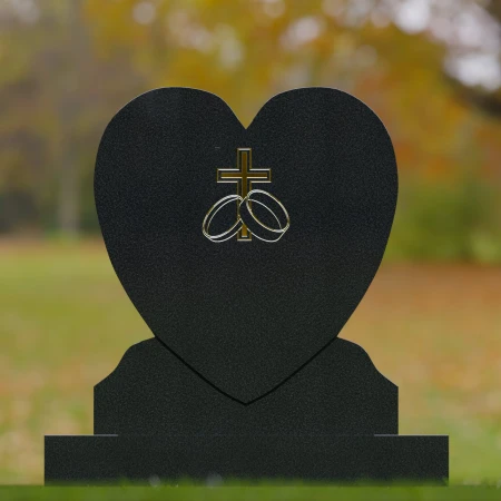 1675 - Herzförmiger Gedenkstein mit Kreuz und Ringen - Eine Hommage an Liebe und Glauben