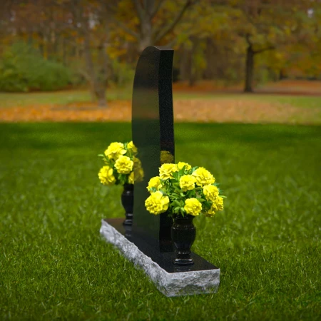Elegant curved granite headstones with wave accents for timeless memorials.