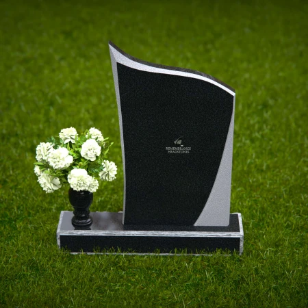 Modern curved memorial headstones crafted with elegant simplicity.