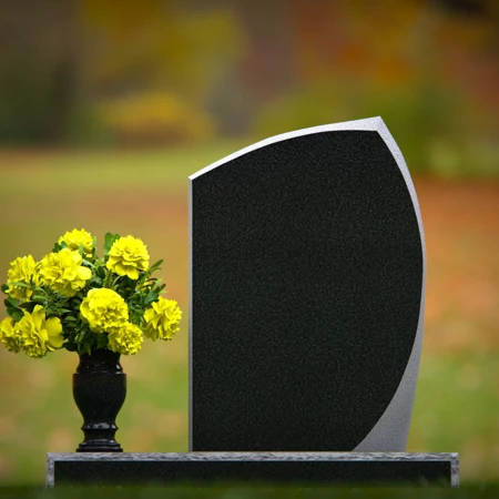 Modern angled granite headstones with vase inclusion for tribute.
