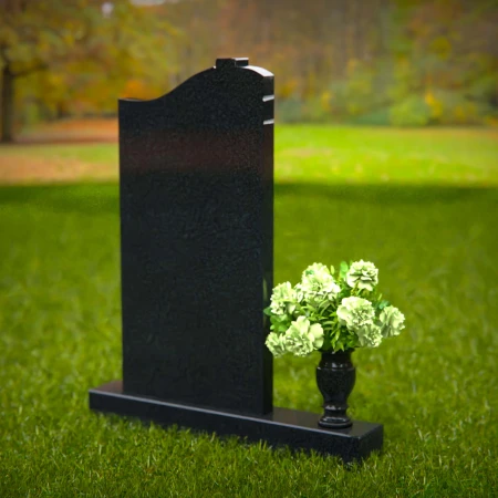 Granite headstones with cross engraving symbolizing faith and remembrance.