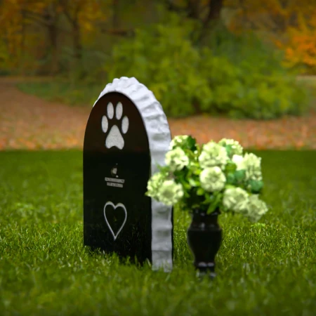Pet memorial headstones with heart design honoring eternal love.