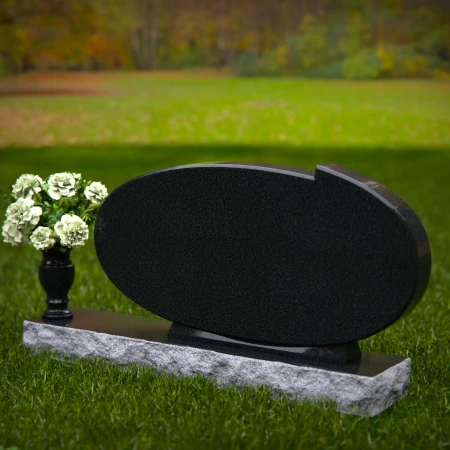 Oval granite headstones with timeless elegance for memorial tribute.