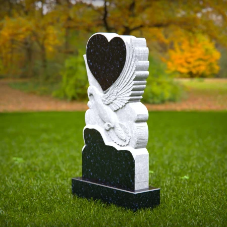 Soaring grace and loving shape unite in dove-heart tombstones