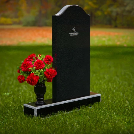 Classic upright headstones with flower vase for timeless memorials.
