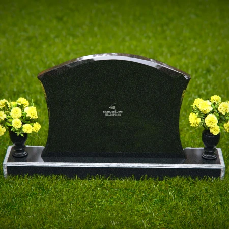 Waved granite headstones with dual flower vases for elegant tribute.