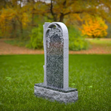 The sheltering arch over a life-giving tree defines these tombstones