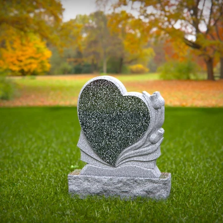 Carved hearts offer a peaceful message in graceful headstones