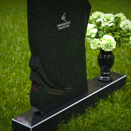 Modern asymmetrical granite headstones with elegant and unique design.