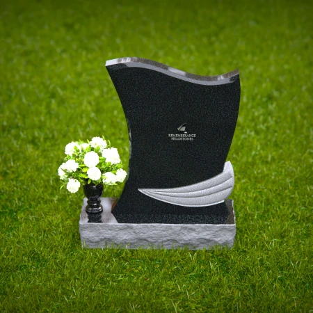 Elegant granite headstones with flowing contoured design and flower vase.