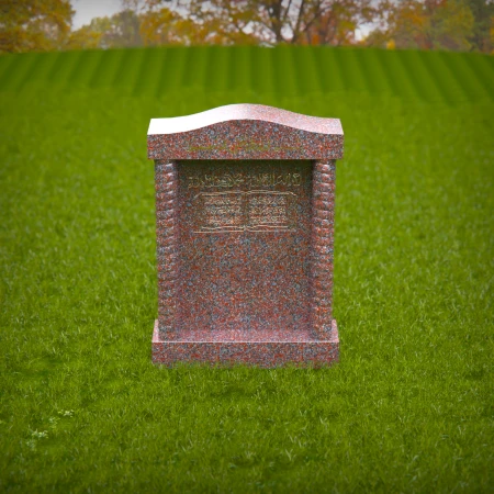 Custom tombstones with cross-carved panels — elegant tribute with spiritual grace