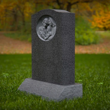 1917 - Upright Monument with Family Relief Carving in Peaceful Setting